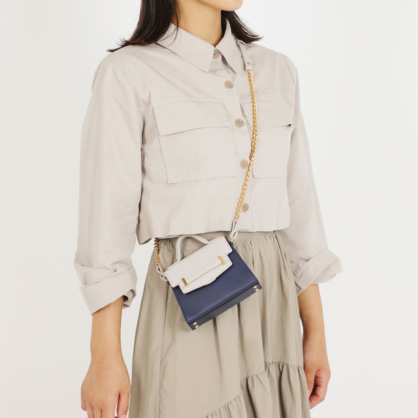 Belted flap / ベルテッドフラップ